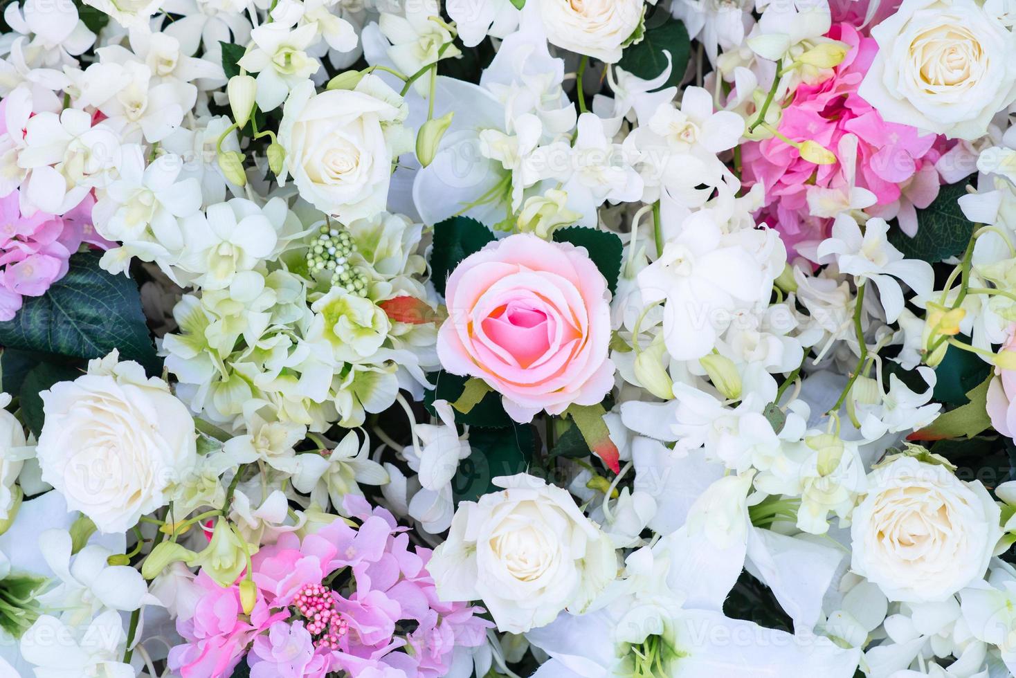 floral antecedentes. lote de artificial flores en vistoso composición foto