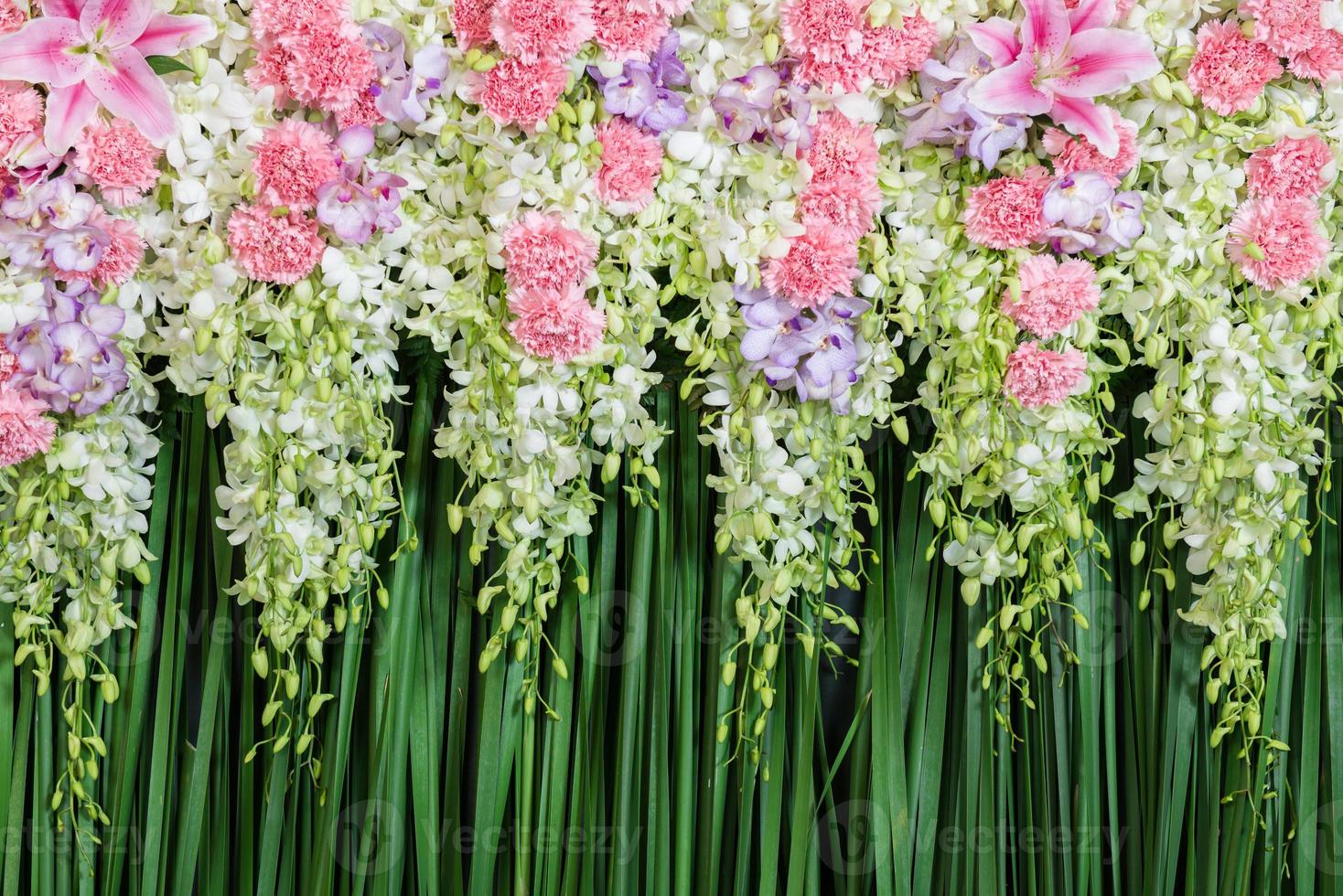 Green backdrop flowers arrangement for wedding ceremony photo