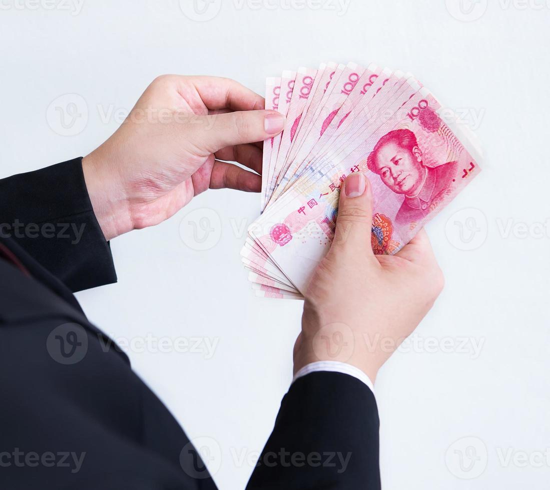 Counting Yuan or RMB, Chinese Currency photo