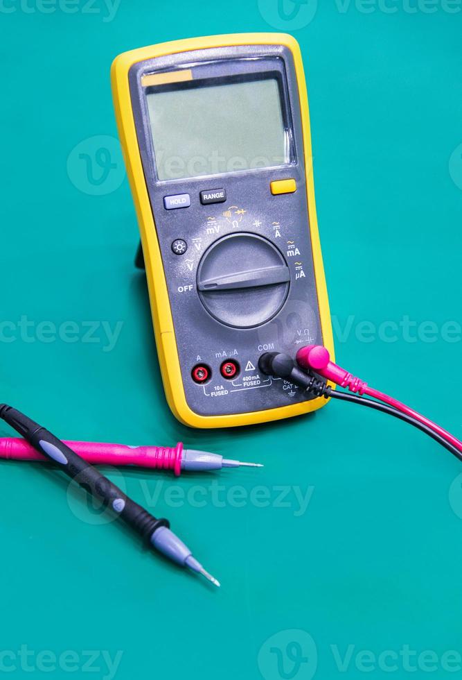 Digital multimeter on ESD table photo