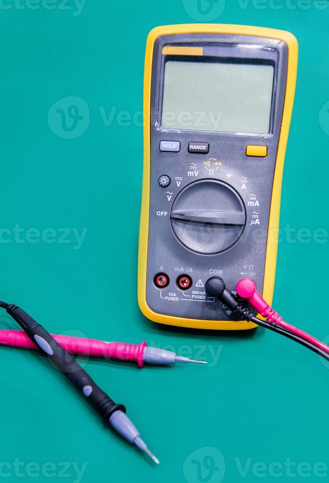 Digital multimeter on ESD table photo