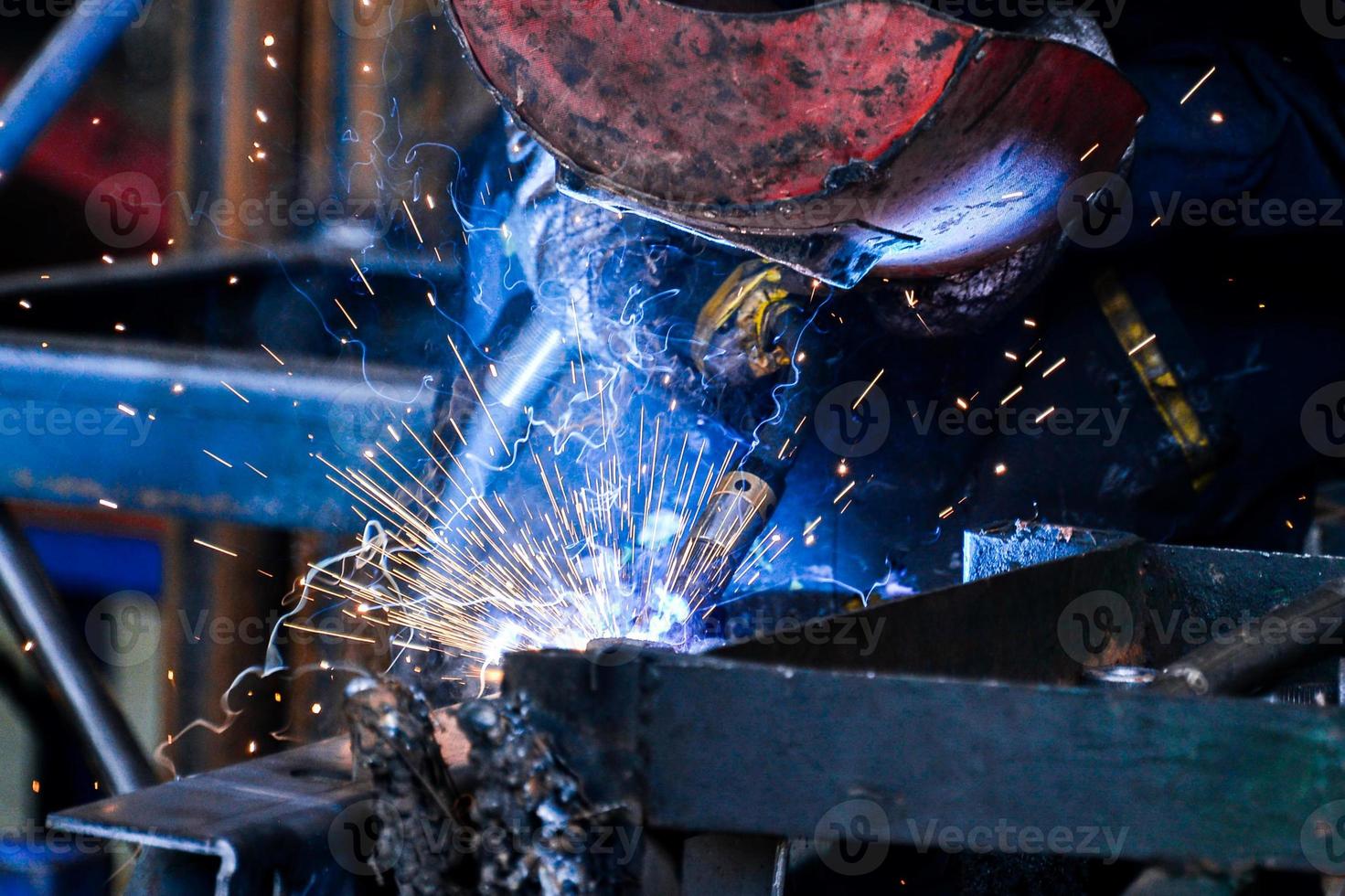 Arc welding of a steel in factory photo