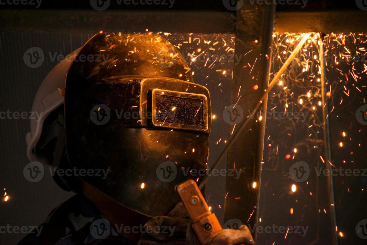 Arc welding of a steel in construction site photo