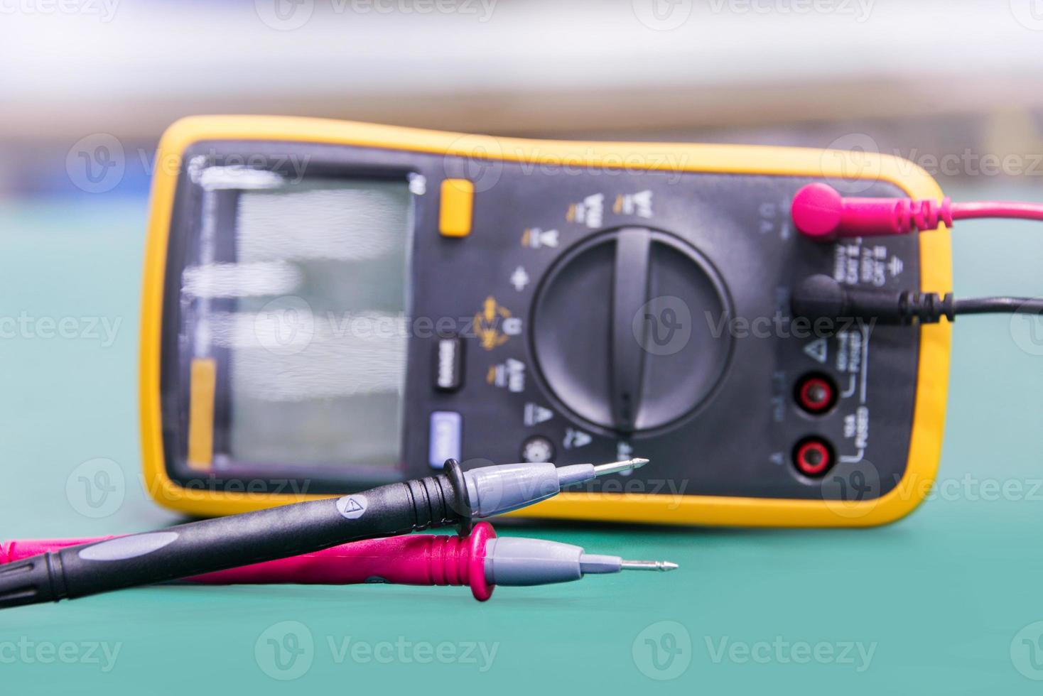 Digital multimeter on ESD table photo