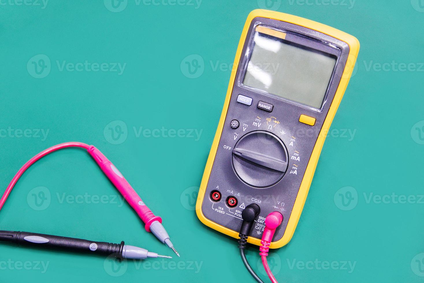 Digital multimeter on ESD table photo