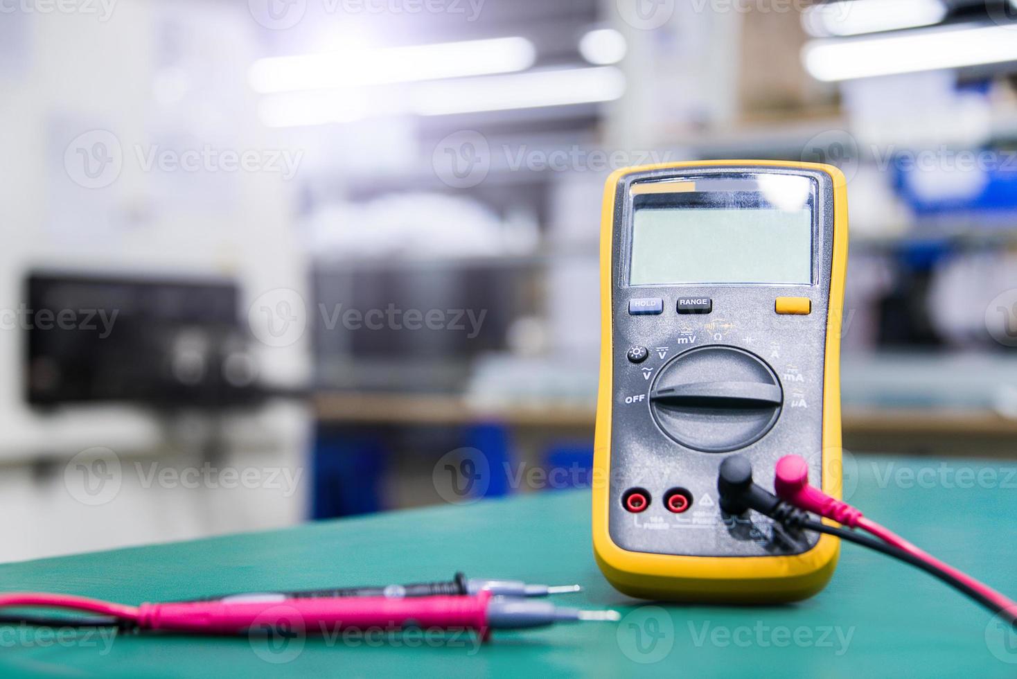 Digital multimeter on ESD table photo