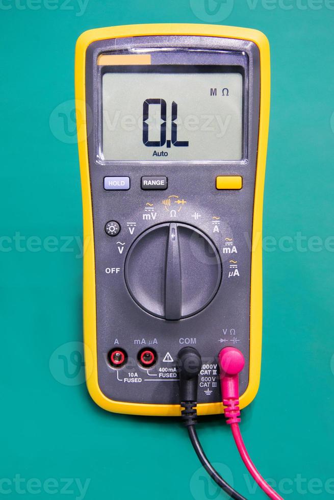 Digital multimeter on ESD table photo
