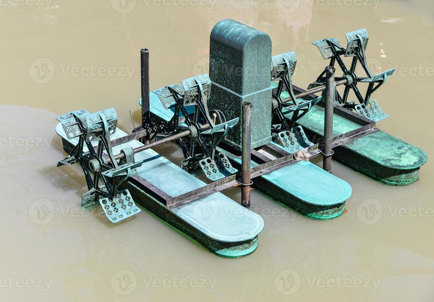 Water turbine in the pond photo