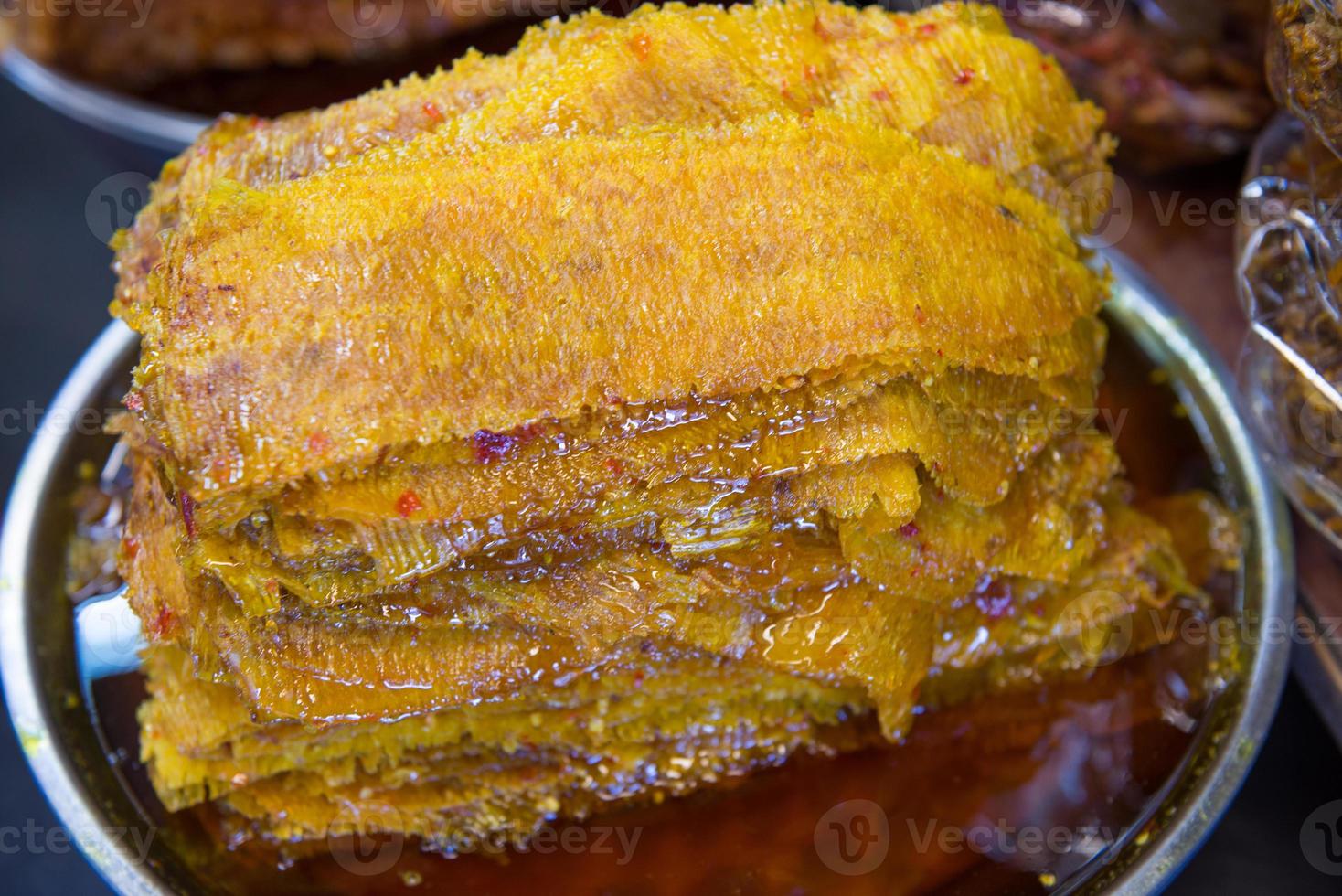 Dried fish with chili sauce photo