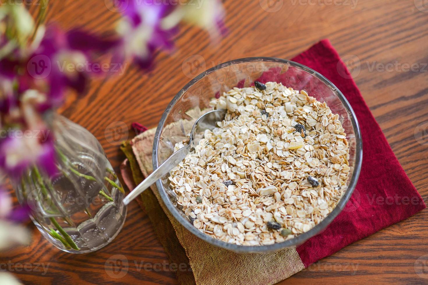 Homemade granola on wood table photo