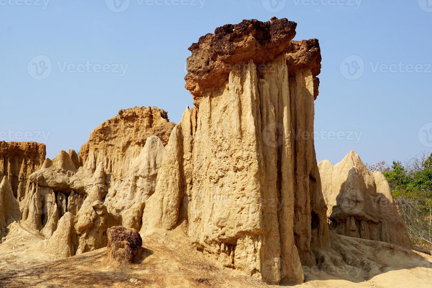 Sao Din is a term used by villagers to refer to sediment patches that look like steep cliffs, bars, cones, recesses, and peaks emerging from the ground on an open field. Soft and selective focus. photo