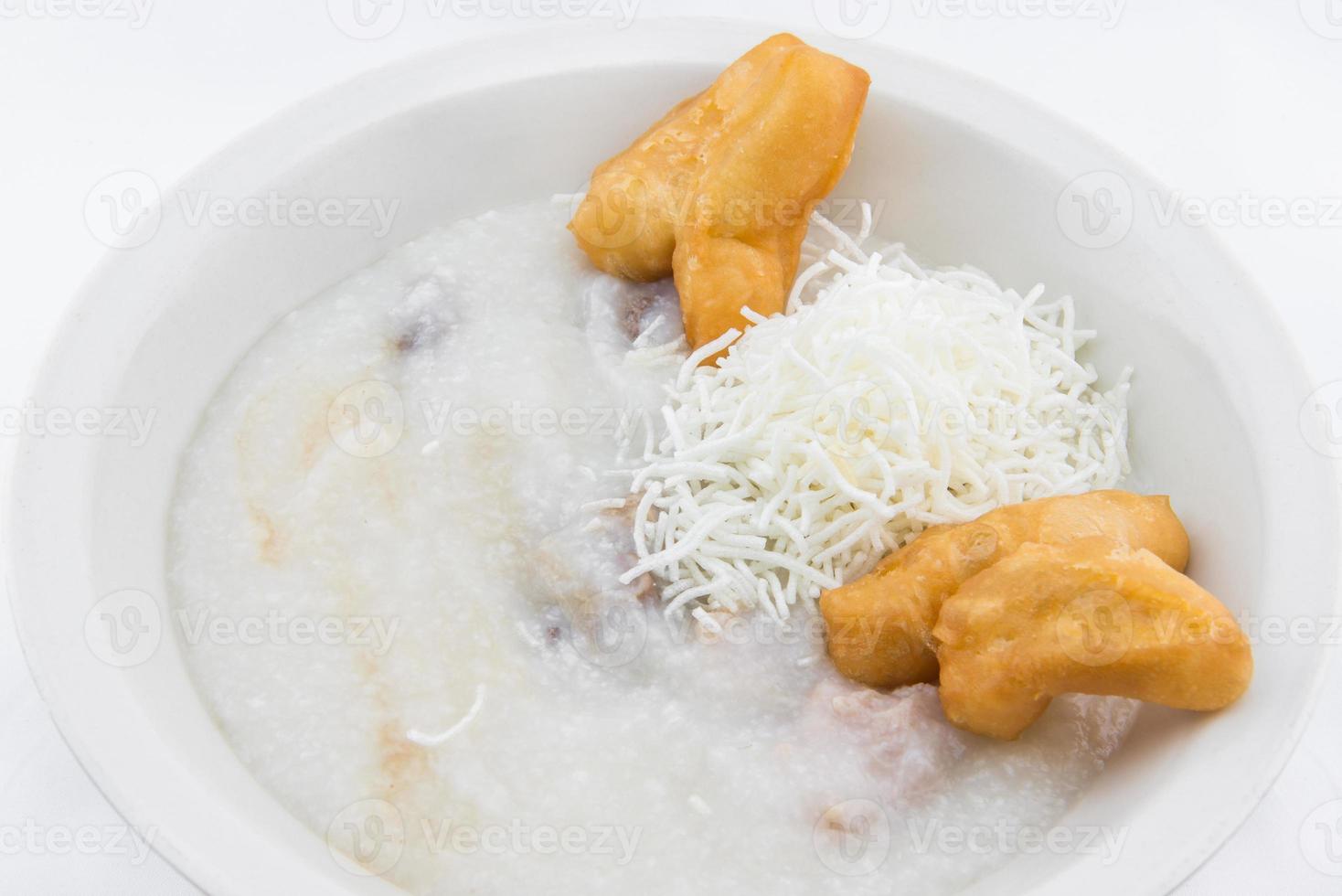 Rice porridge with with fried pastries in Thai style photo