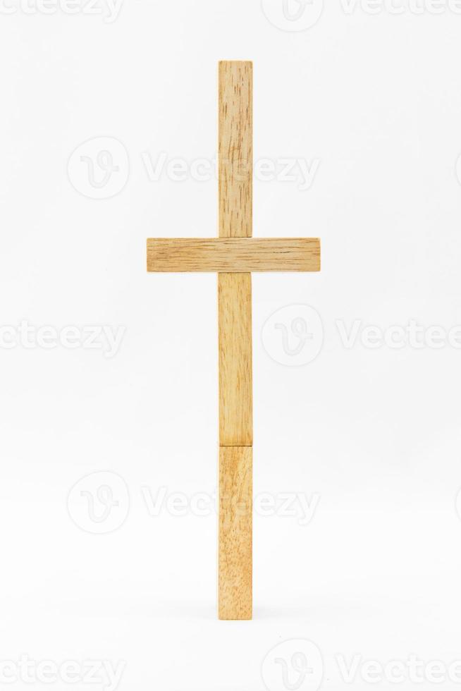 Blocks of wood isolated on white background, cross shape photo