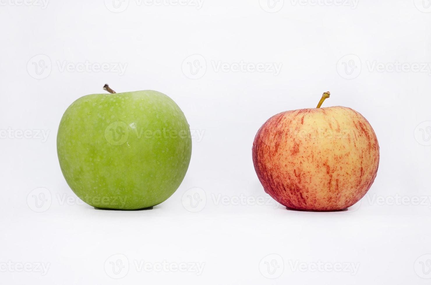 Sweet red and green apples on white BG photo