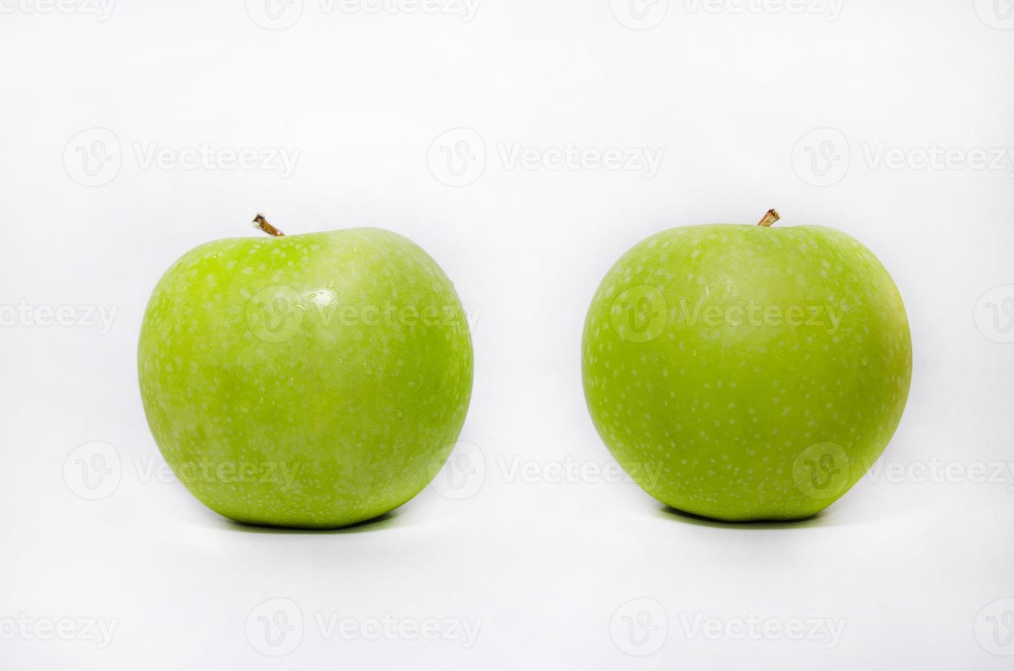 Green apples on white BG photo