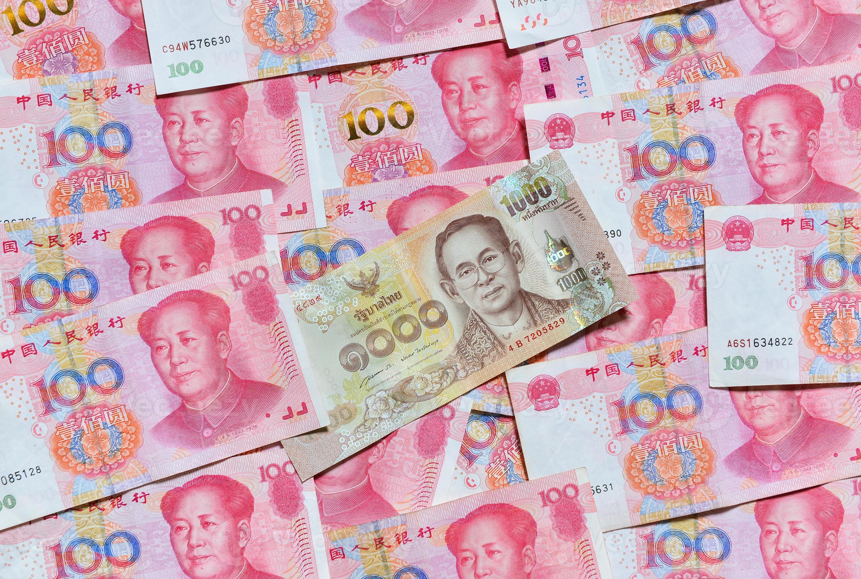 Yuan Or RMB Chinese Currency And Thai Baht 21897707 Stock Photo At 