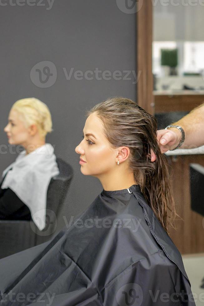 Woman with wet long hair photo