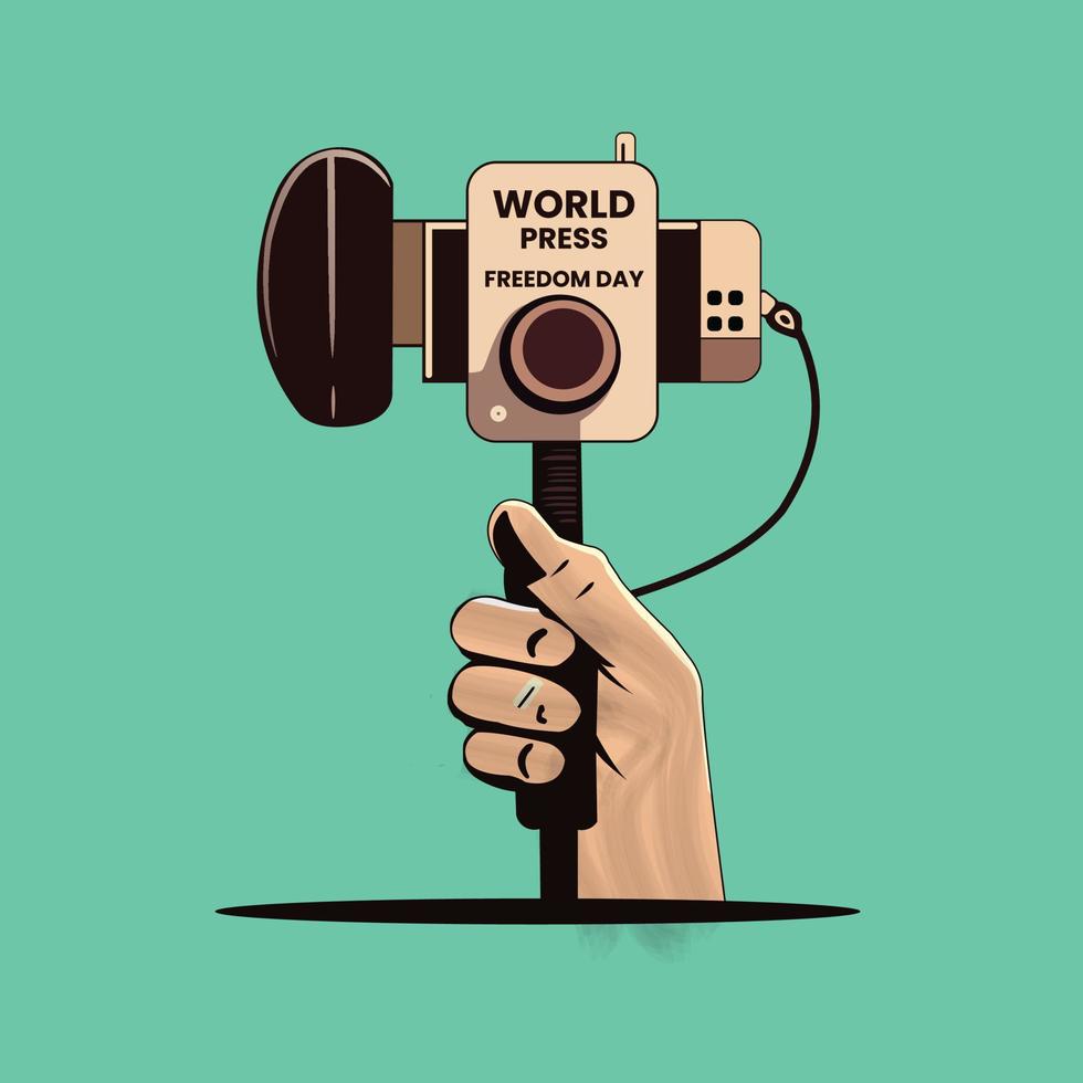 A hand holding a camera that says world press freedom day vector