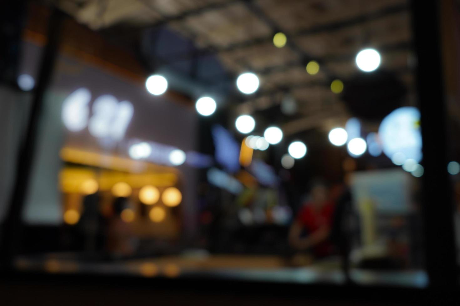 Defocused urban abstract texture background, blurred lights, blur cafe in the background, light bokeh photo