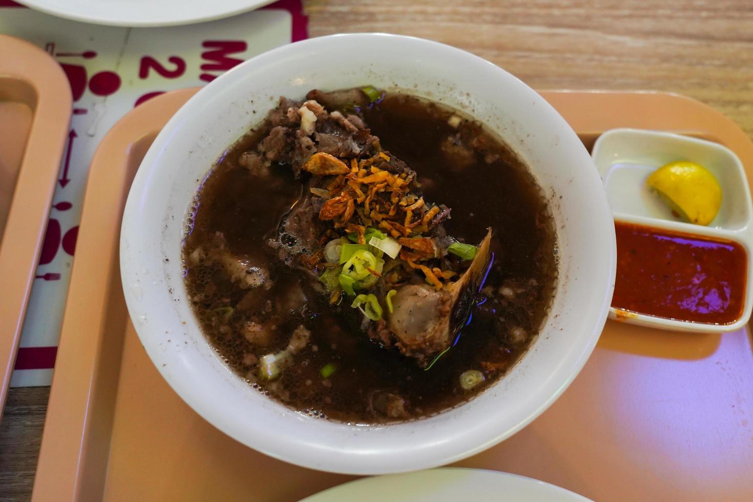 Sop Konro Soup, konro bakar grilled the delicious one, Beef Soup is usually made from ribs or oxtail, a typical Indonesian soto dish originating from Makassar photo