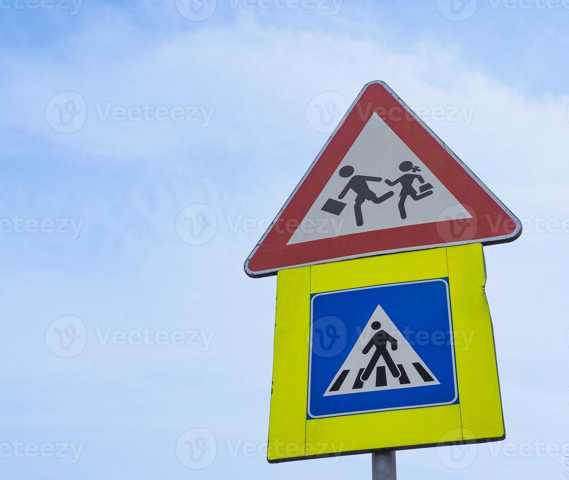 zebra crossing and school sign photo