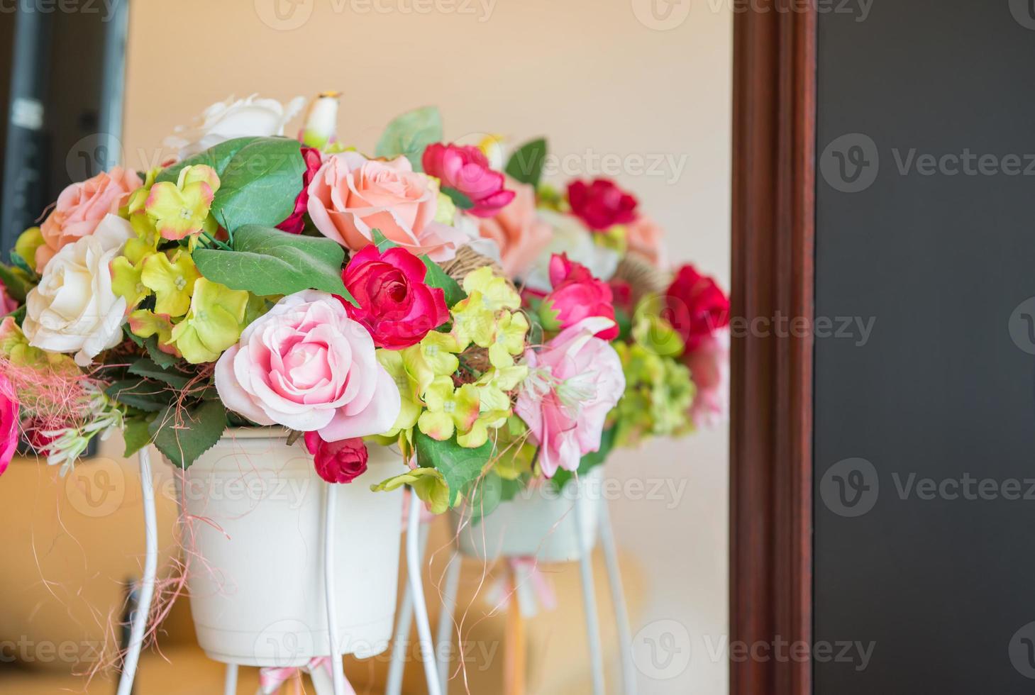 Colorful rose flower in pot photo