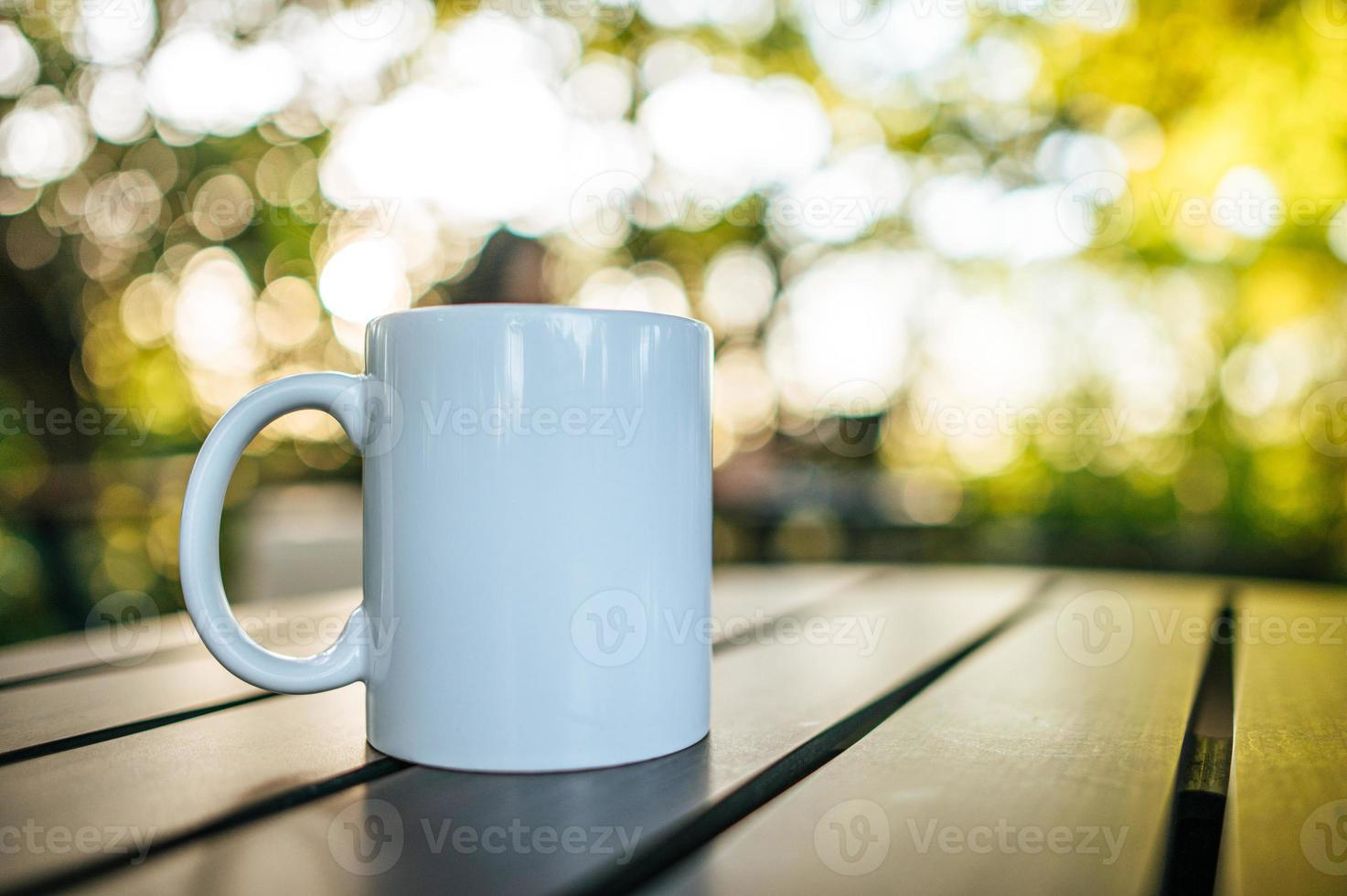 coffee cup on wooden table photo