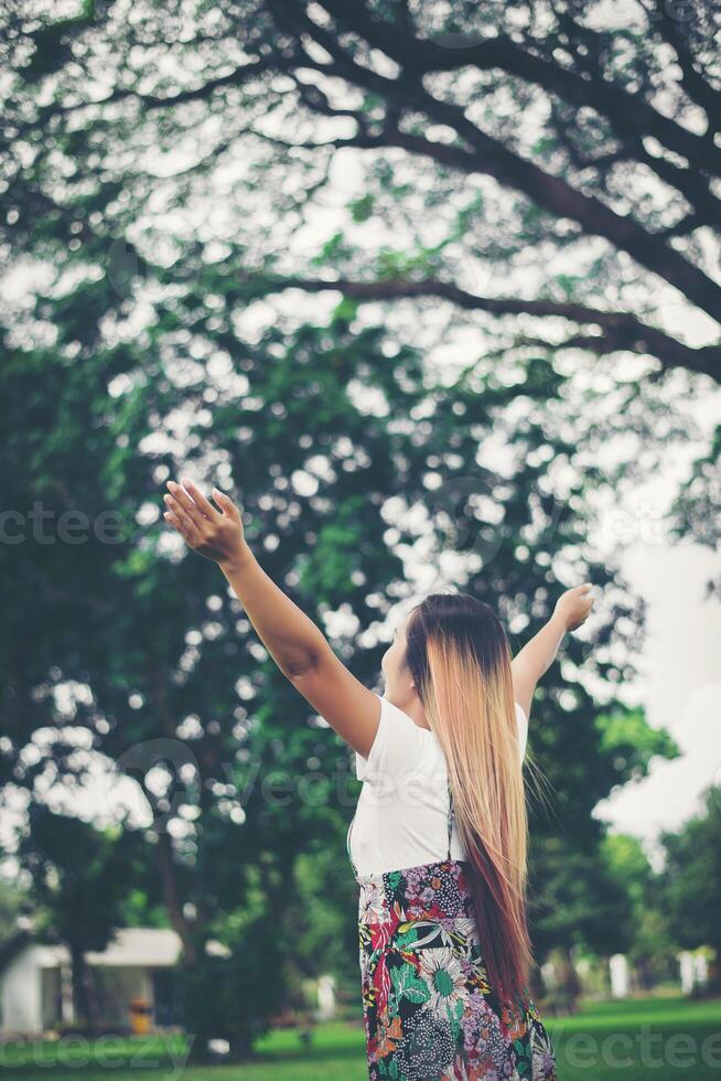 Beautiful woman enjoying the nature photo