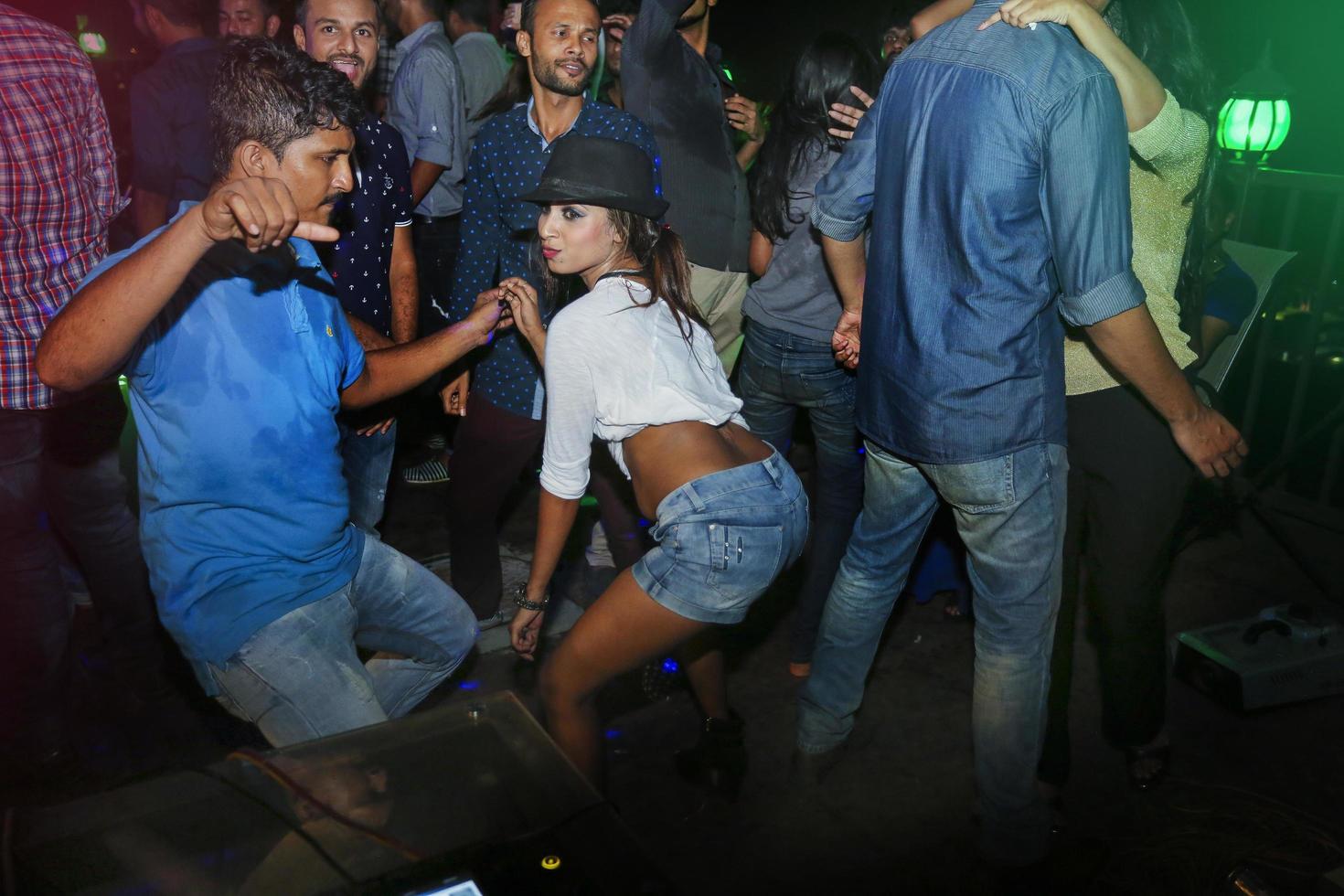 Bangladesh, October 23, 2015, People dancing and enjoying DJ Party at Picasso Restaurant in Capital city of Dhaka. photo