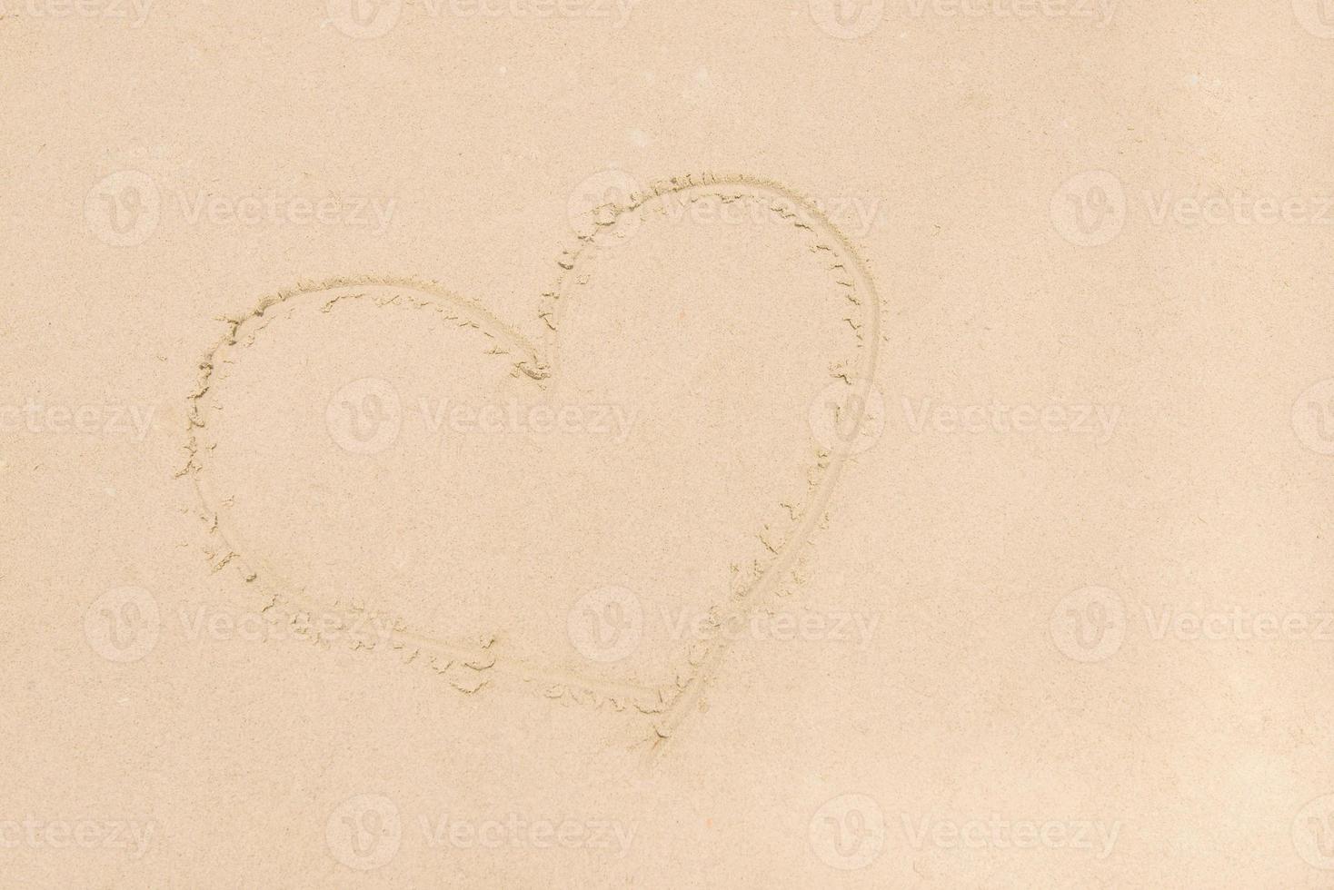 sand beach as heart shape photo