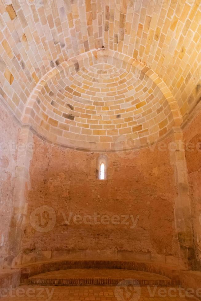 interior stone apse in a Romanesque catholic church photo