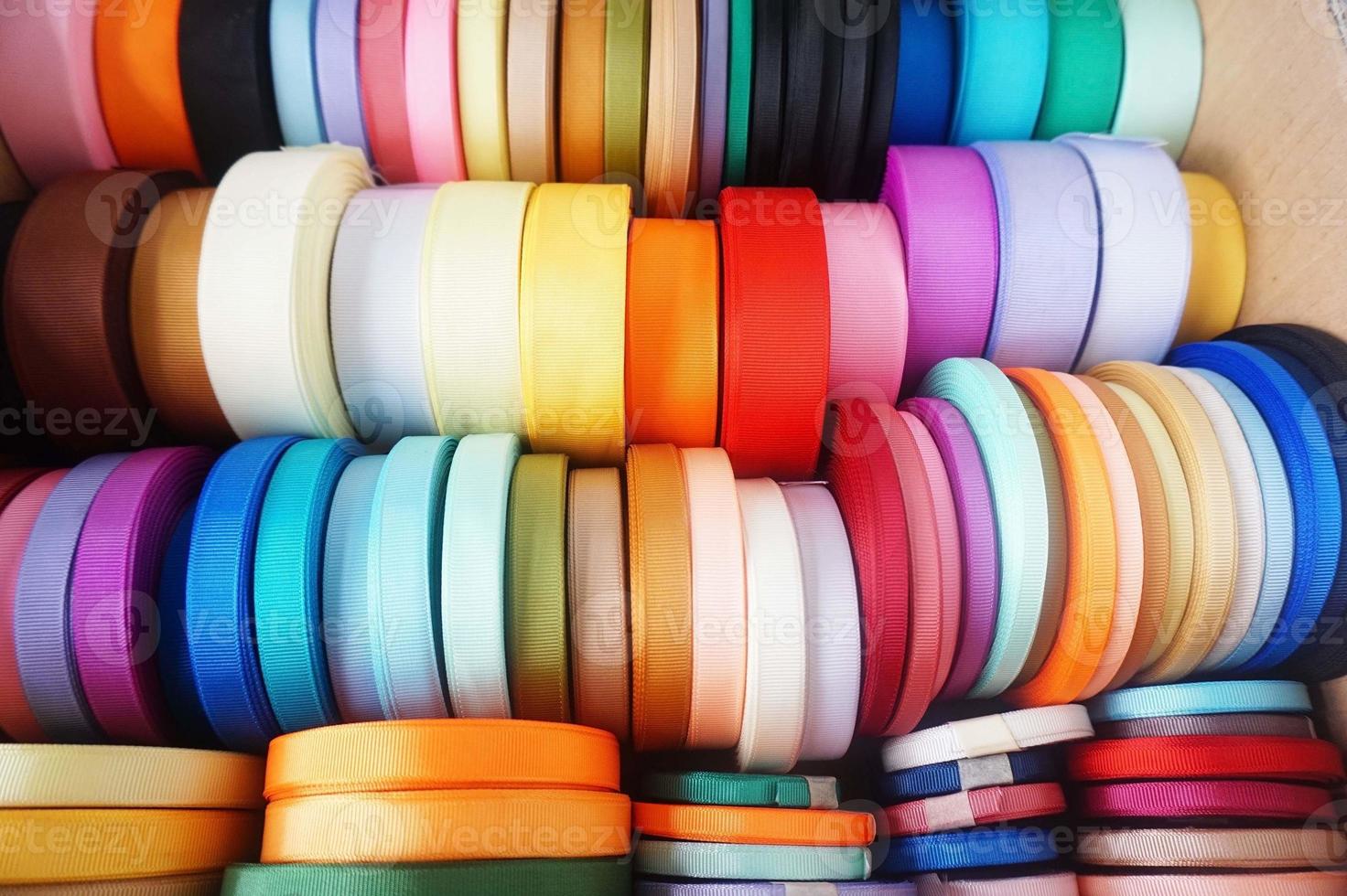 a few rolls of colorful ribbon for crafting, handmade items and DIY photo