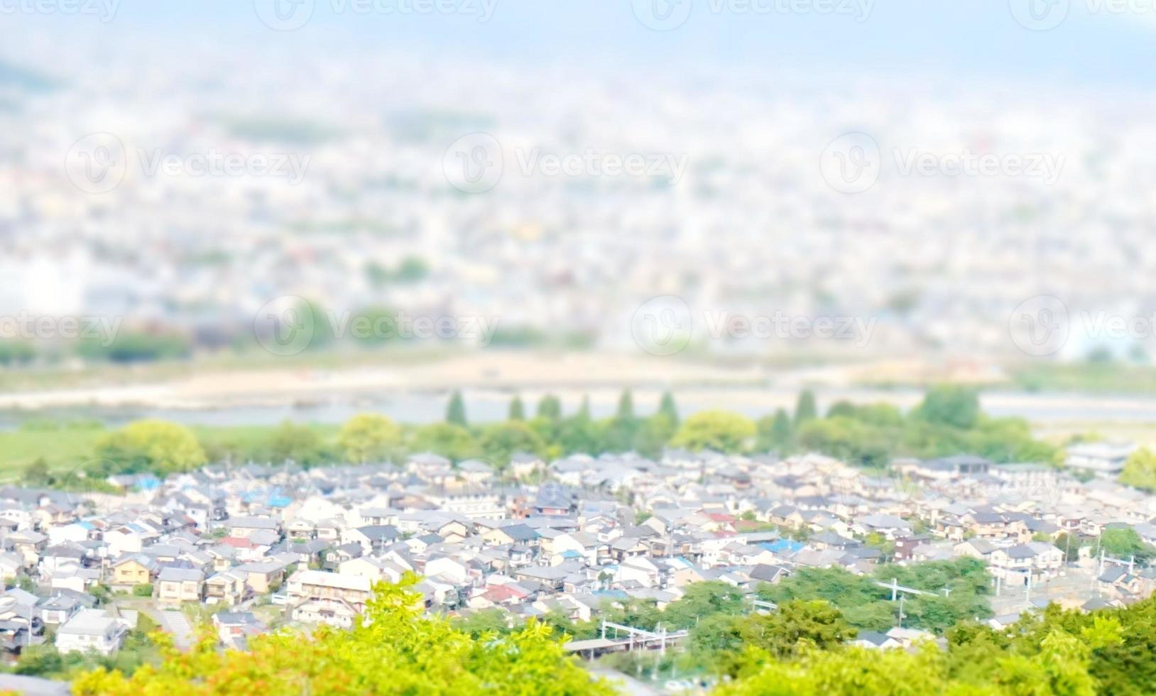 blur image of cityscape with bokeh in miniature effect for background usage. photo