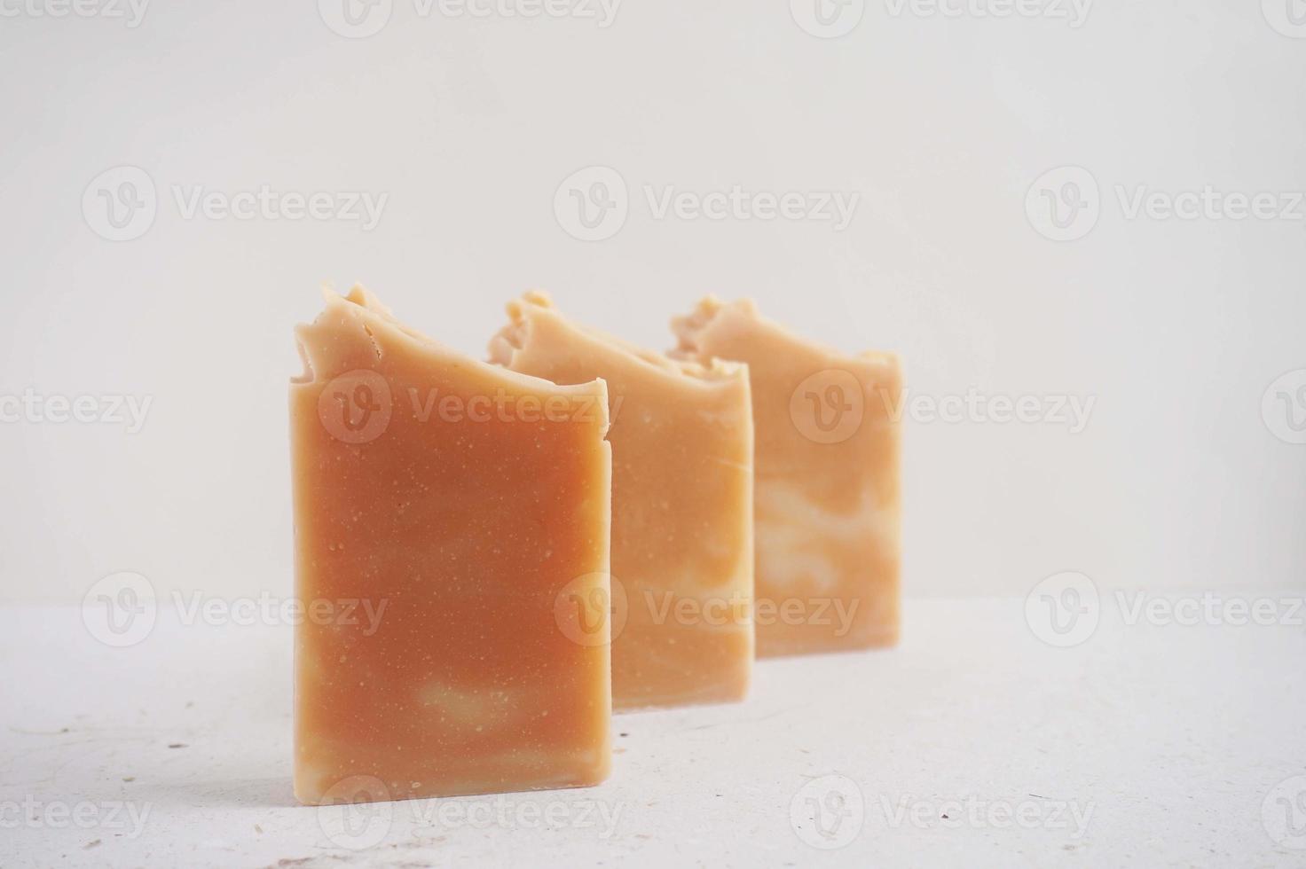 Handmade soap bars on a white background. Selective focus. photo