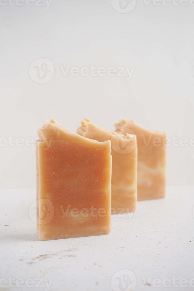 Handmade soap bars on a white background. Selective focus. photo