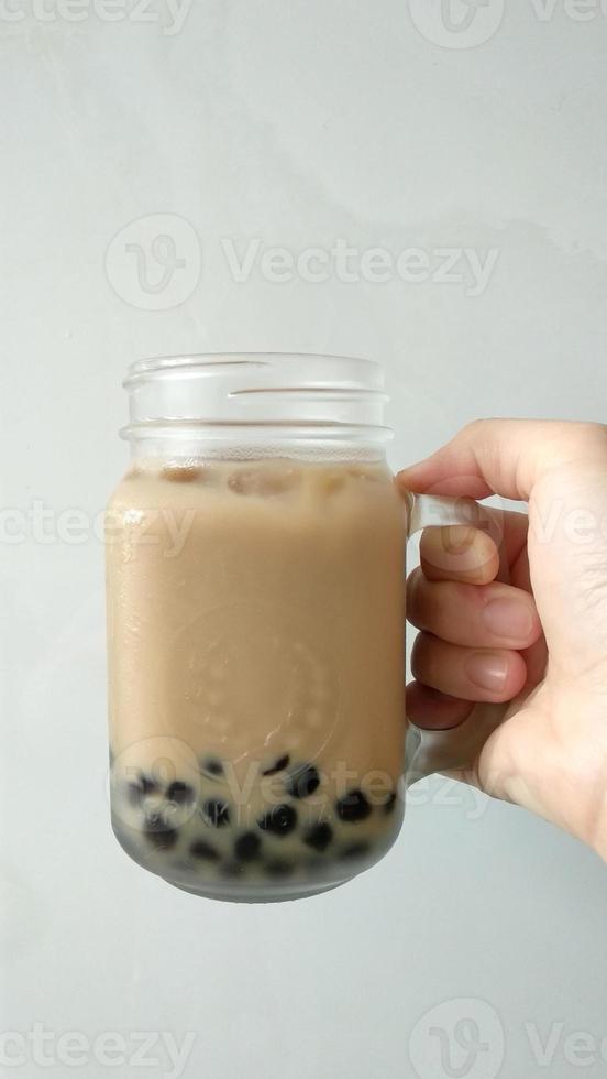 iced coffee in a glass cup on a white background photo