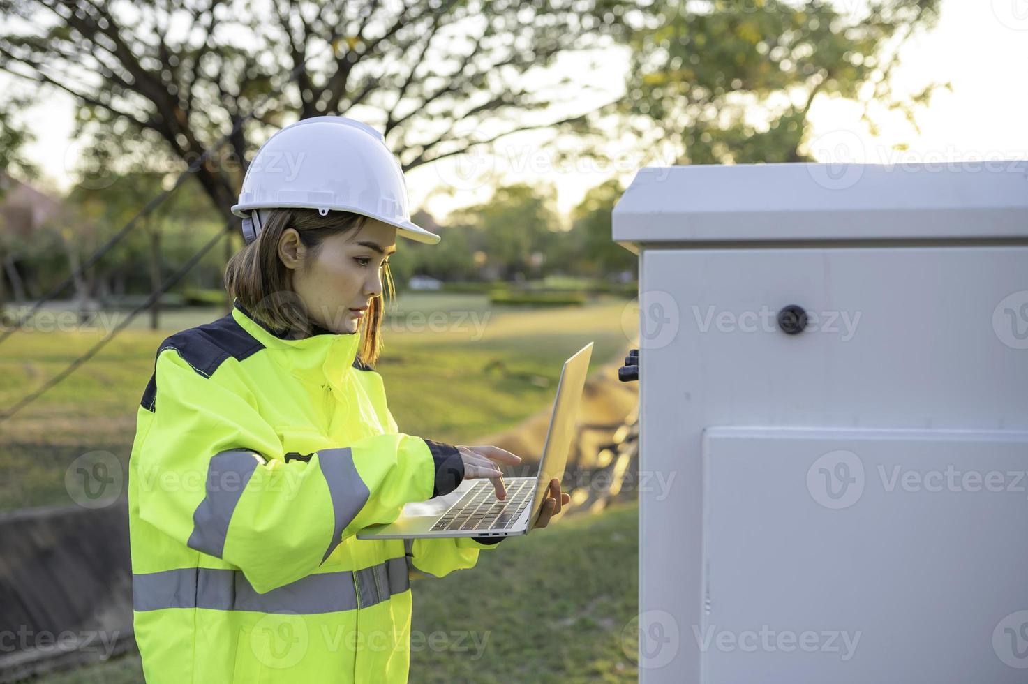 Telecommunication engineers work at cell towers for 5G cell phone signals,Network tower maintenance technicians photo