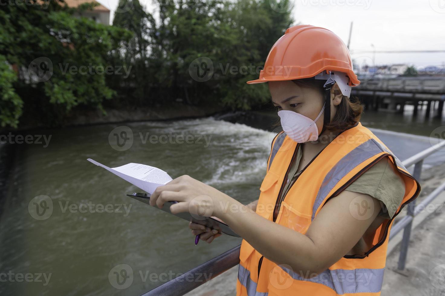 An advanced electrical engineer inspects the electrical system of the waterworks,Maintenance technicians for the control system of the wastewater treatment system photo