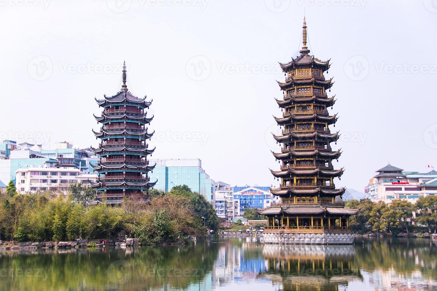 Sun and Moon Pagodas in downtown of Guilin, Guangxi Province, China. photo