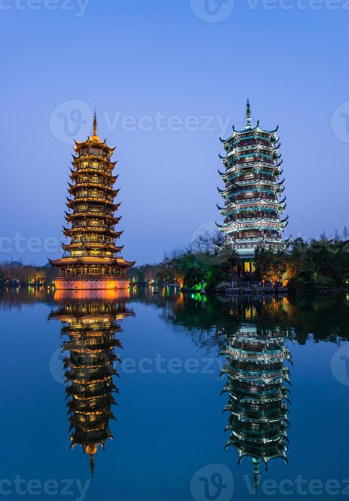 Sun and Moon Pagodas in downtown of Guilin, Guangxi Province, China. photo
