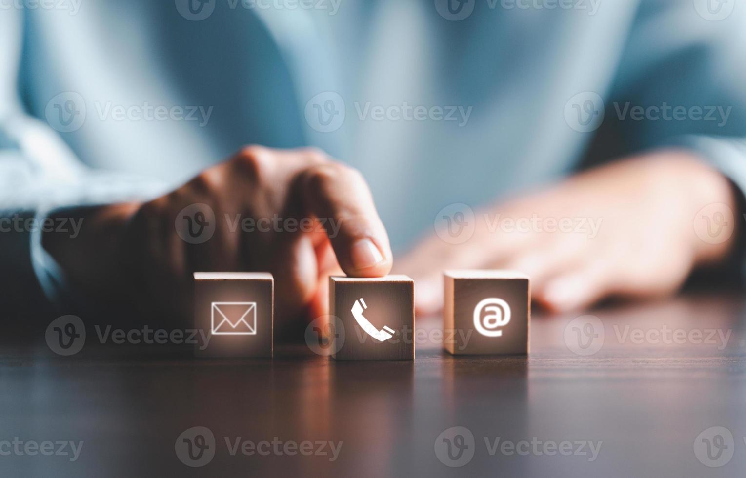 Website page contact us or e-mail marketing concept, Customer support hotline Contact us people connection. cube wood with email, call phone, address, Chat message icons. banner with copy space. photo