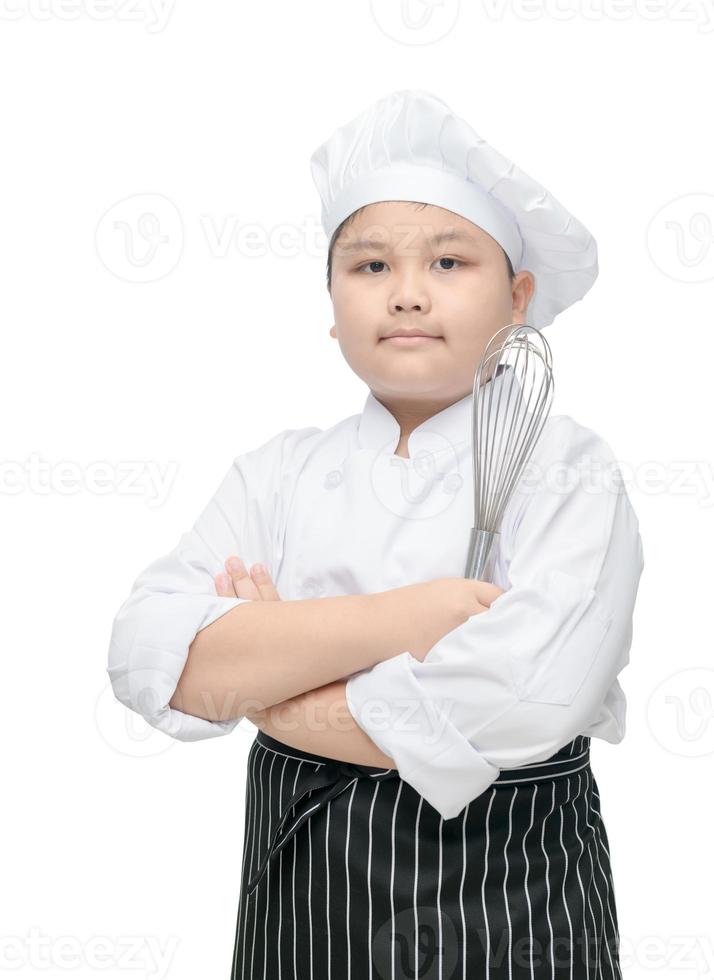 Kid chef hold whisk with cook hat and apron photo