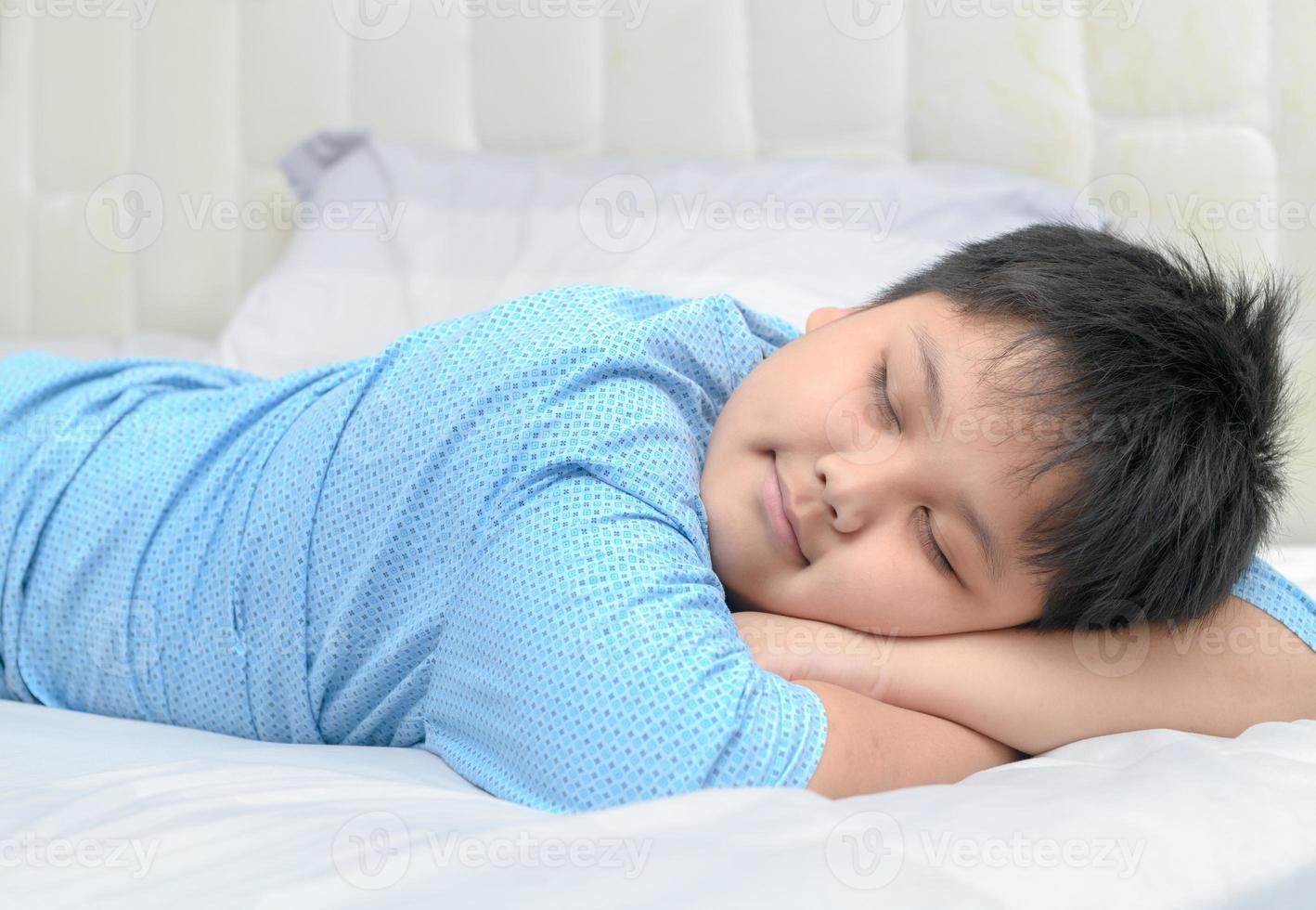 Obese fat boy sweet dream on his arm photo