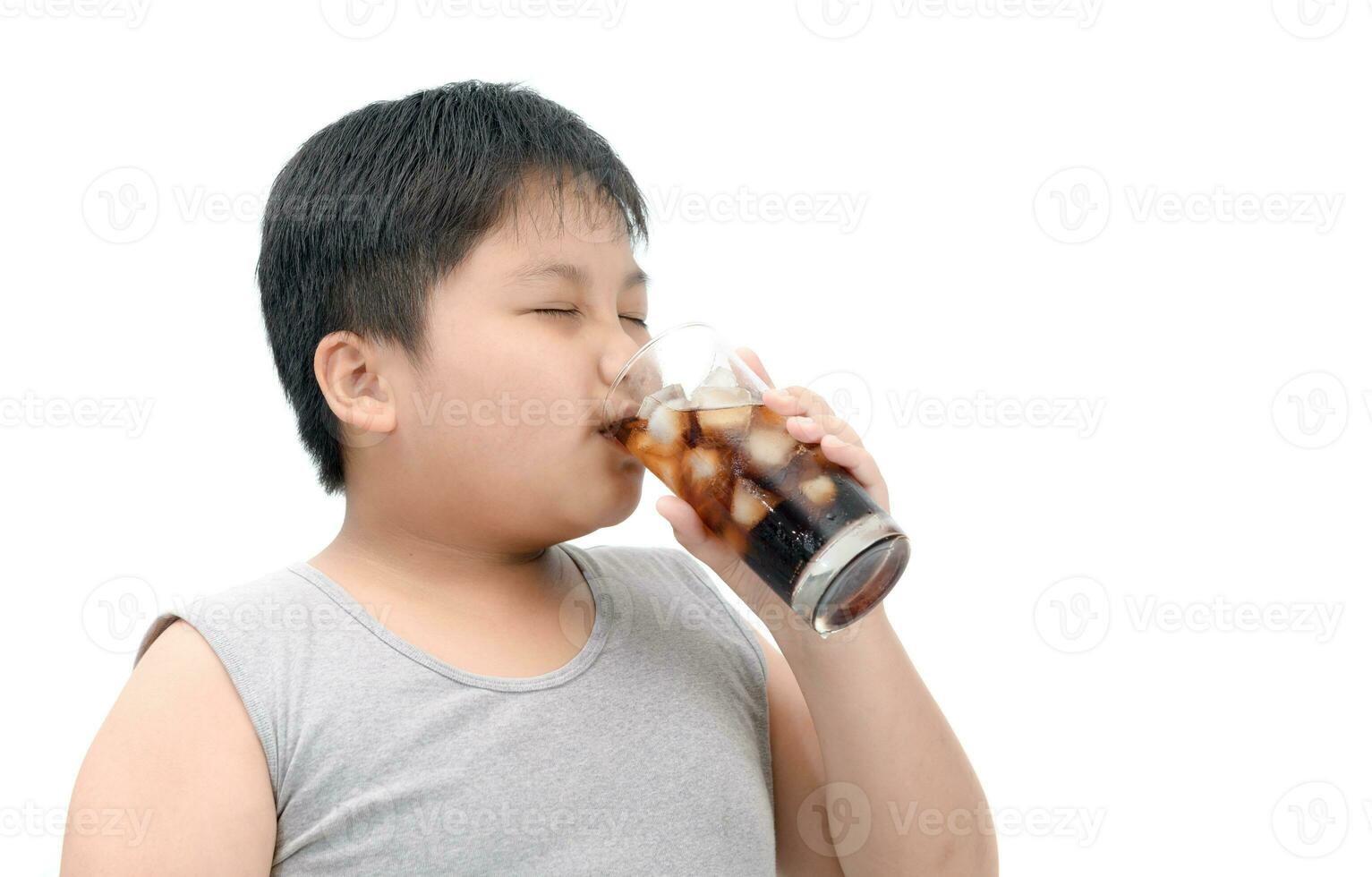 Obese fat boy drinking cola isolated on white photo