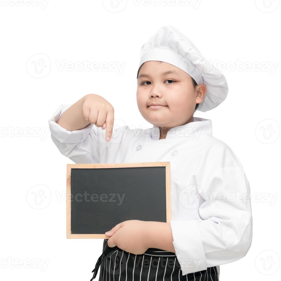 asiático chico cocinero en uniforme cocinar participación pizarra foto