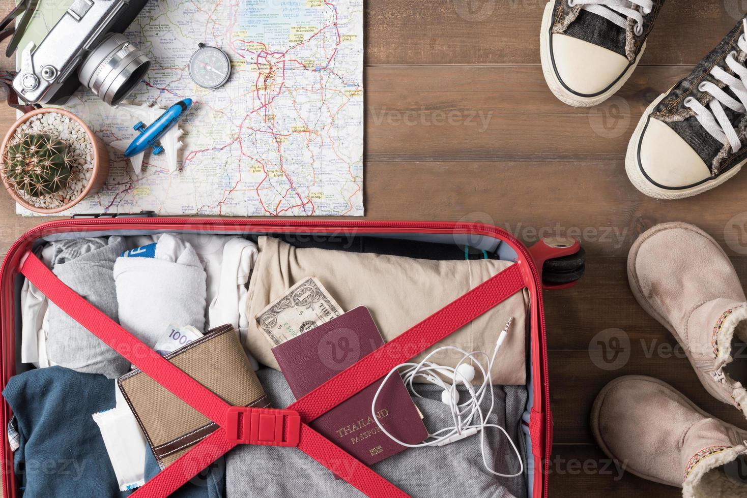 Travel accessories costumes. Passports, luggage, camera, sunglasses, boot, sneaker photo