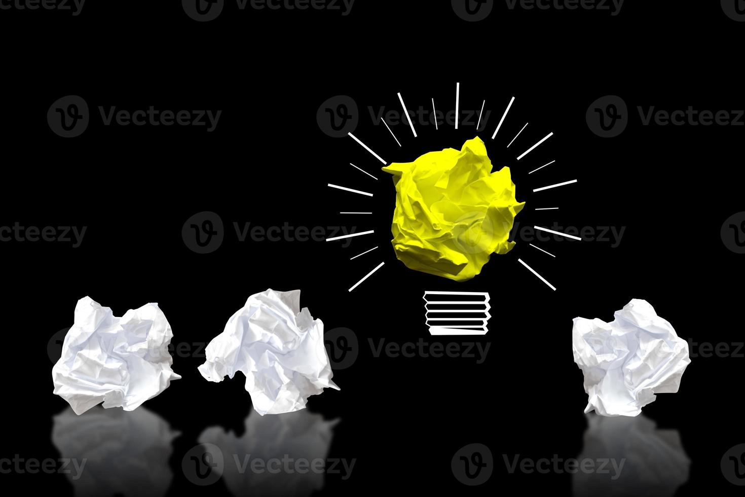 Paperball Light Bulbs on Black Background - Idea, Creativity Concept photo