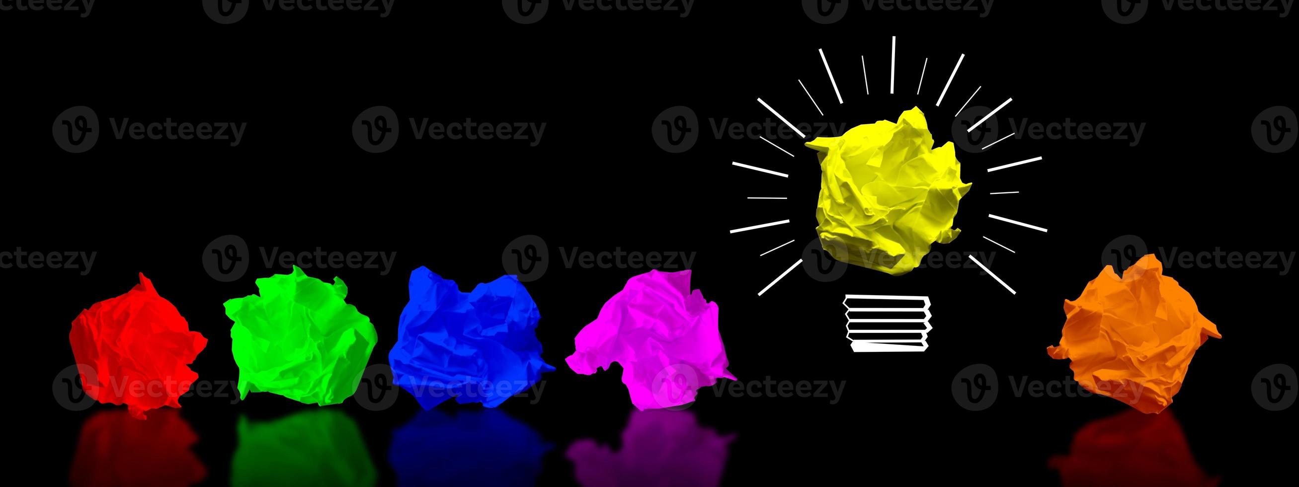 Colorful Paperballs Light Bulbs on Black Background - Idea, Creativity Concept photo