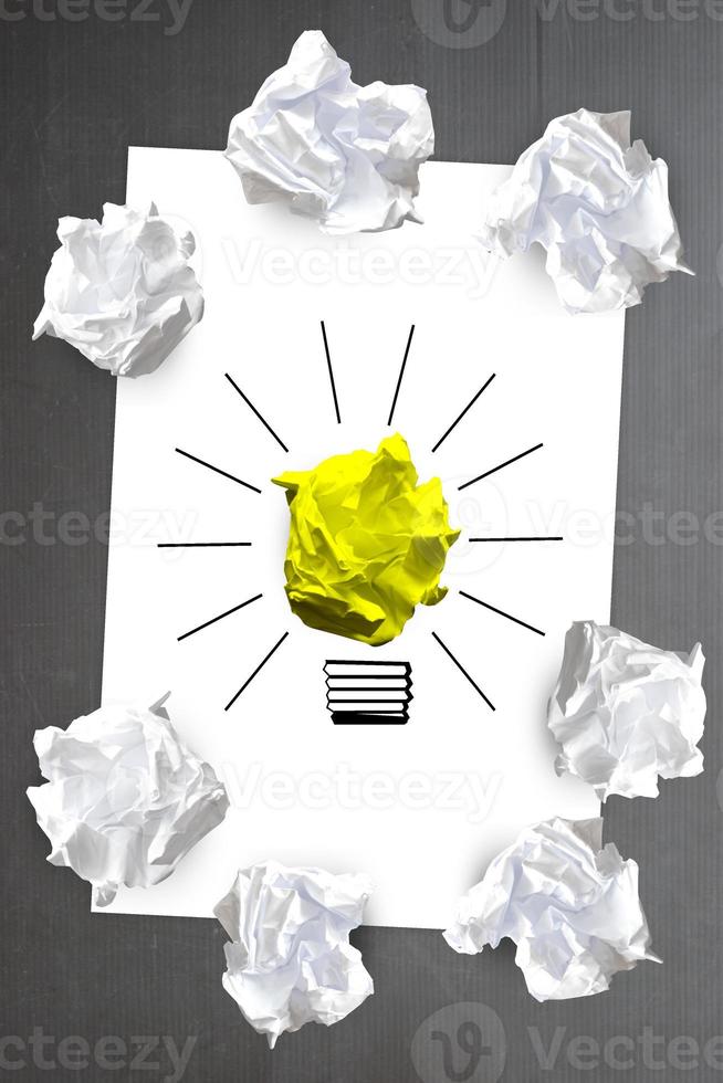 Light Bulb Icon Made with Crumpled Paper - Idea, Creativity Concept photo