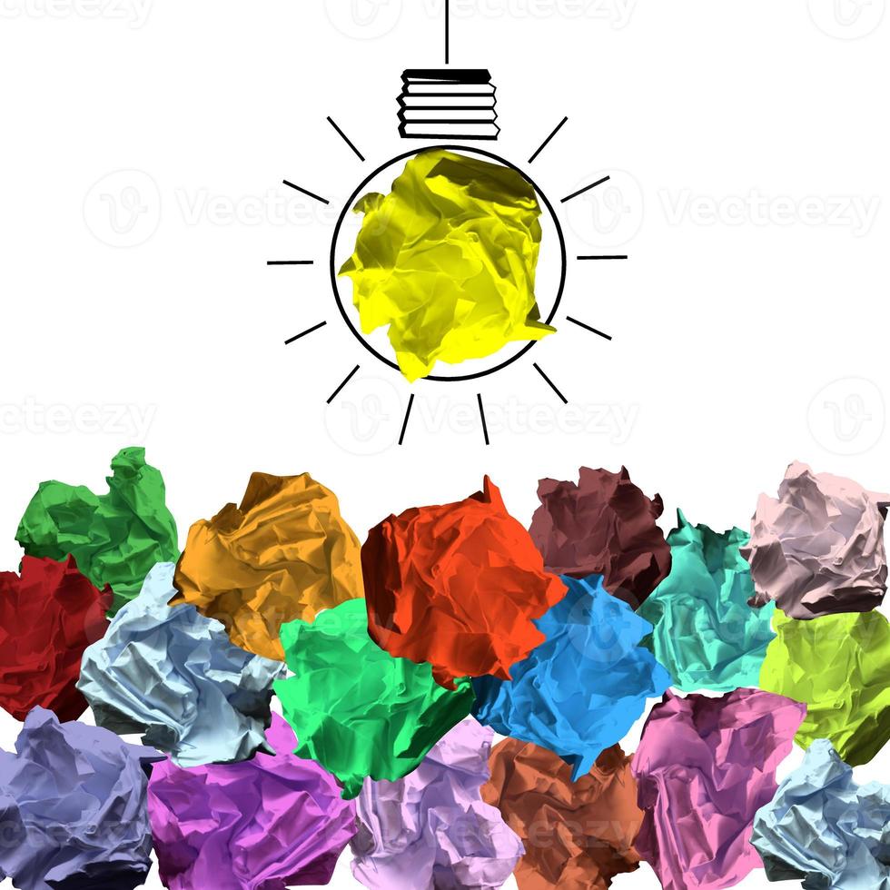 Light Bulb Icon and Colorful Crumpled Papers - Idea, Creativity Concept photo